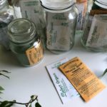 seed packets in glass jars